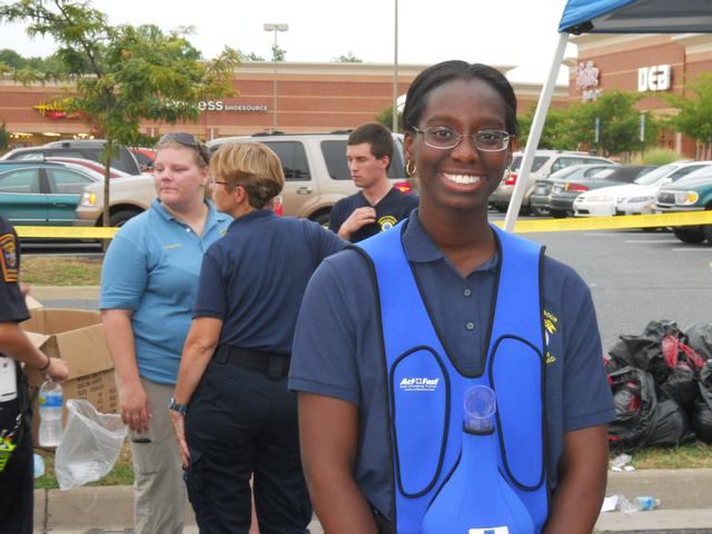 Junior Member, Ashley Williams, show the Heimlich Maneuver to participants at NNO 2011